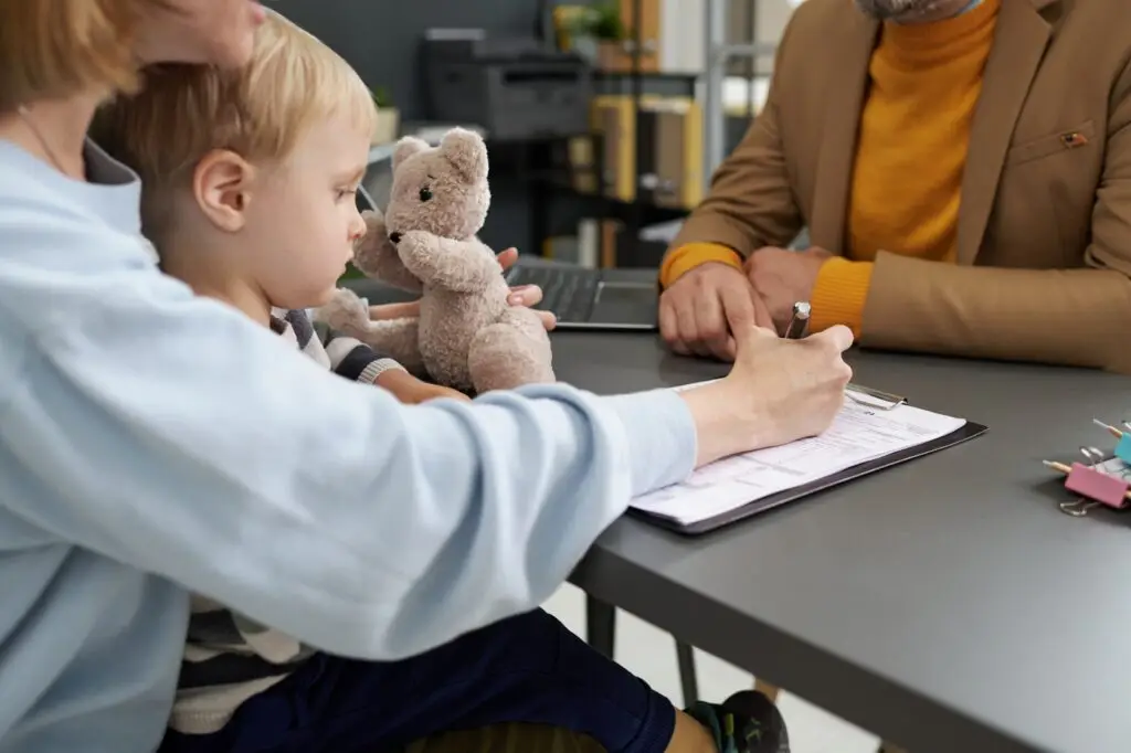 Young mother filing documents for adoption